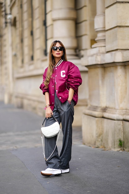 PARIS, FRANCE - JULY 01: Heart Evangelista wears black sunglasses, diamonds and burgundy pendant sto...