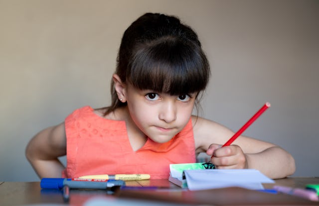 A little girl surrounded by school supplies. A mom took to Reddit this week to ask if she was wrong ...