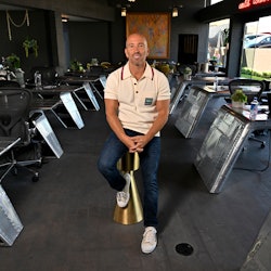 Jason Oppenheim in his Newport Beach, CA, office at the Oppenheim Group.