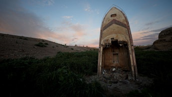 LAKE MEAD NATIONAL RECREATION AREA, NEVADA - AUGUST 19: A formerly sunken boat stands upright in a s...