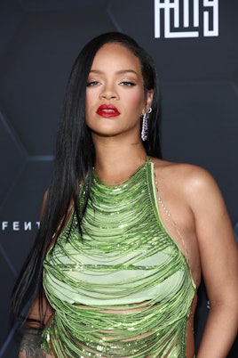 LOS ANGELES, CALIFORNIA - FEBRUARY 11: Rihanna poses for a picture as she celebrates her beauty bran...