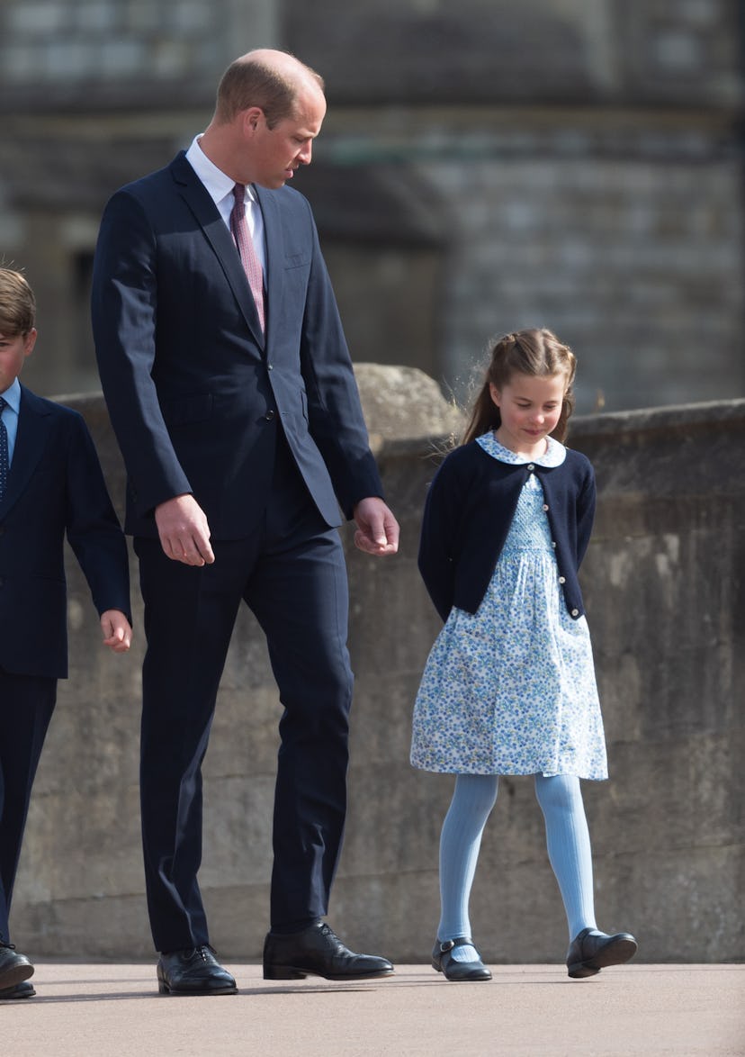 Prince William and Princess Charlotte having a chat.
