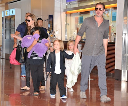 TOKYO, JAPAN - JULY 28:  Brad Pitt, Angelina Jolie and their children Pax, Knox and Vivienne arrive ...