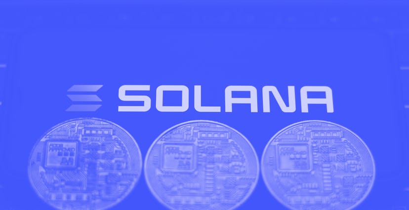 Solana logo displayed on a phone screen and representation of cryptocurrencies are seen in this illu...