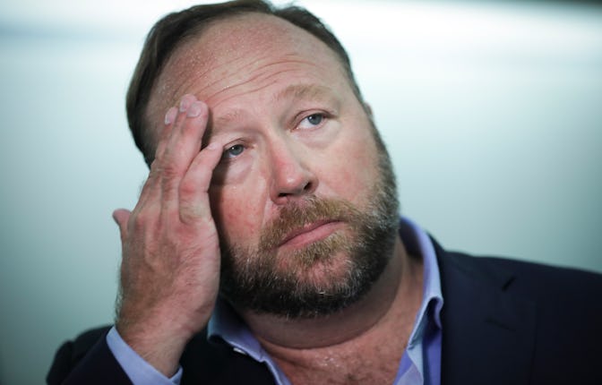 WASHINGTON, DC - SEPTEMBER 5: Alex Jones of InfoWars talks to reporters outside a Senate Intelligenc...