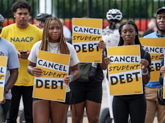 WASHINGTON, DC - AUGUST 25: Student loan debt activists rally outside the White House a day after Pr...