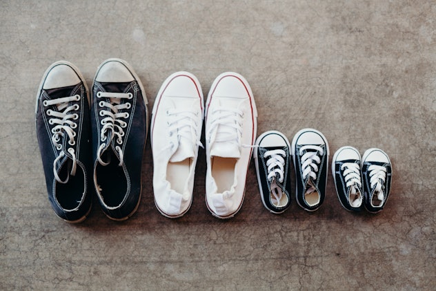 Four pairs of shoes with laces lined up, three black pairs and one white pair. A super cute and crea...