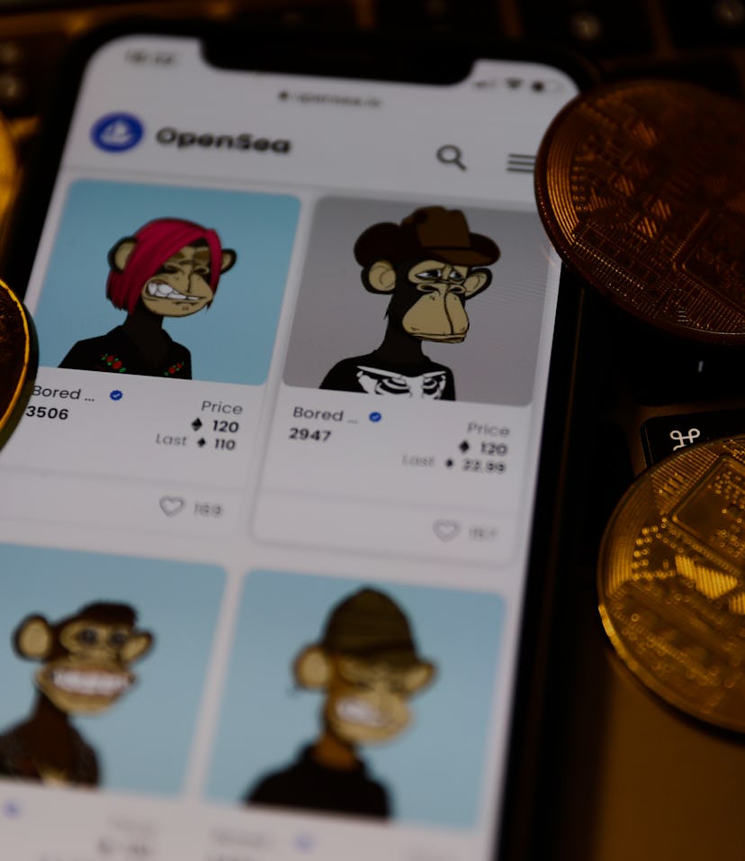 Bored Ape Yacht Club collection in OpenSea displayed on a phone screen, representation of cryptocurr...
