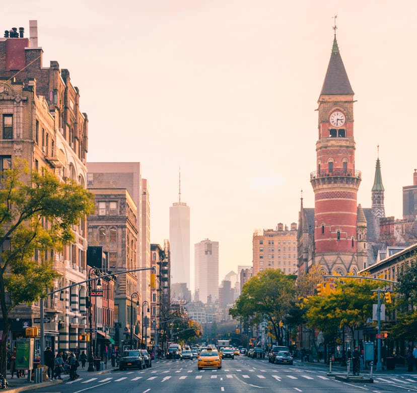 6th Avenue and Jefferson Market Library with the One World Trade Center (Freedom Tower) skyscraper i...