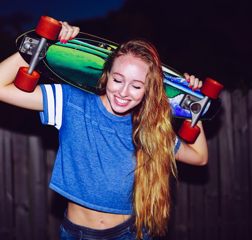 a woman with shiny, healthy hair thanks to heat-free styling hacks from tiktok