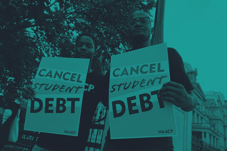 Two protesters hold signs that say "Cancel Student Debt" and look at the camera