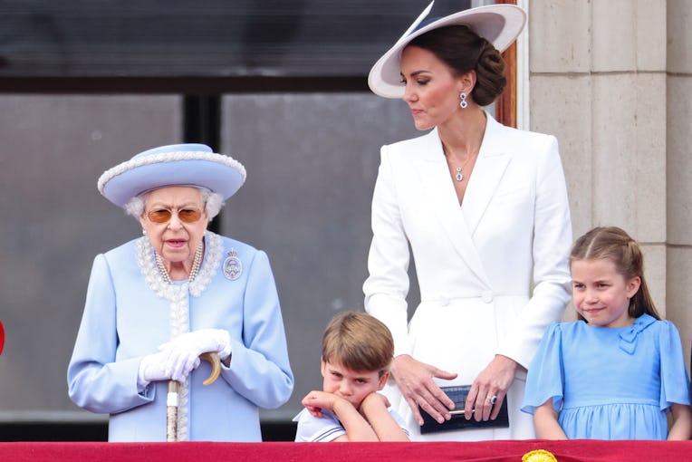 LONDON, ENGLAND - JUNE 02:  (L-R) Queen Elizabeth II speaks to Prince Louis of Cambridge as Catherin...