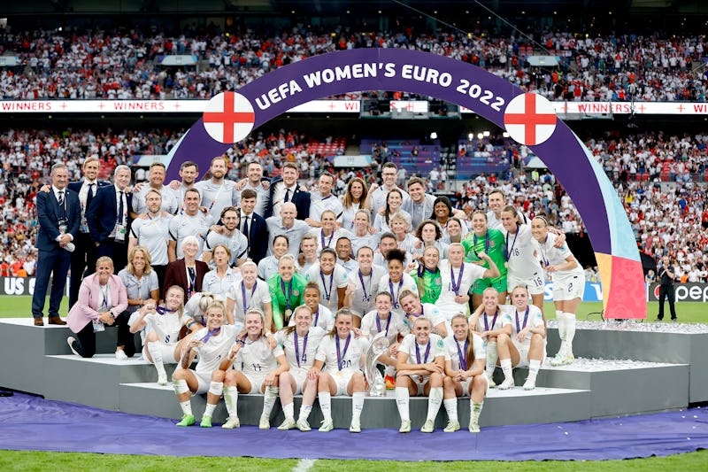 LONDON, ENGLAND - JULY 31: Players and staff of England celebrate with the UEFA Women’s EURO 2022 Tr...