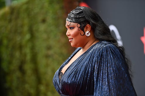 After watching a young listener's TikTok dance to "About Damn Time," Lizzo shared her emotional reac...