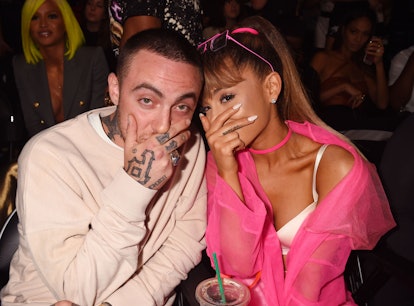Rapper Mac Miller and singer Ariana Grande pose backstage during the 2016 MTV Video Music Awards at ...