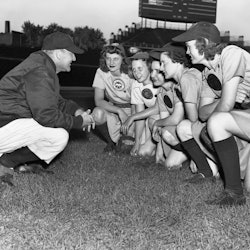 Former hockey player Eddie Stumpf manages the Rockford Peaches of the All-American Girl's Profession...