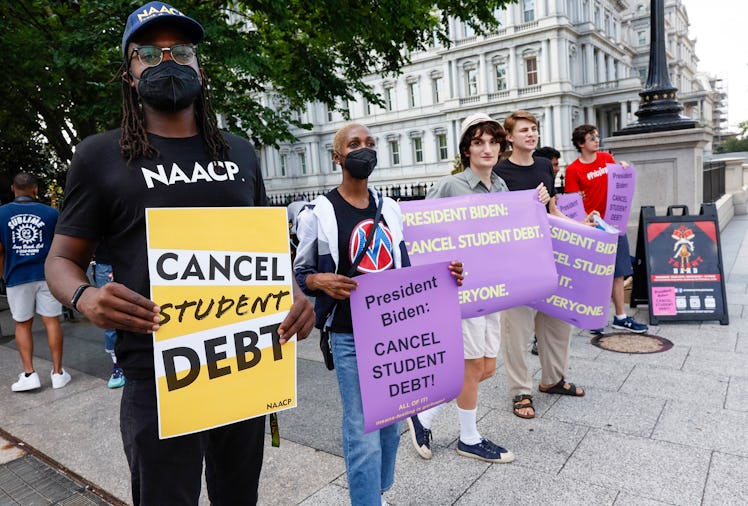 Student loan debt holders take part in a demonstration outside of the white house staff entrance to ...