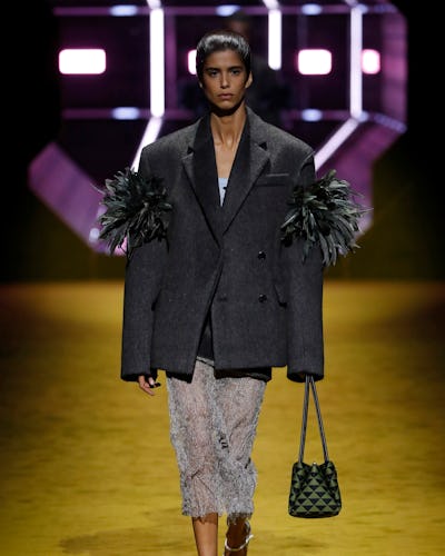 Prada runway showing feathers