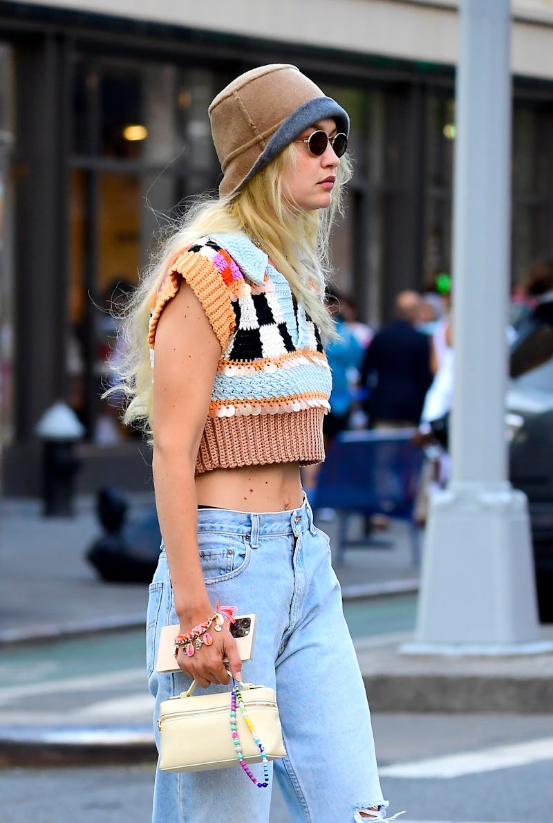 Gigi Hadid Channels The Weird Girl Aesthetic In Crop Top & Converse