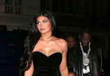 Kylie Jenner wore silver eyeshadow at a Kylie Cosmetics event in London. Jenner's makeup look was a ...