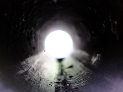 Sewer and drain pipe, light at the end of the tunnel.