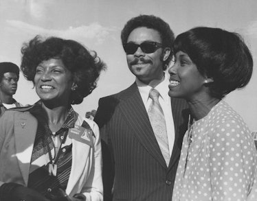 Black and white photograph of, from left, actress Nichelle Nichols, Curtis Graves, Director of Commu...