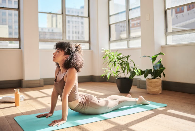 Moving from a child's pose to a cobra pose can release tension in your lower back and spine.