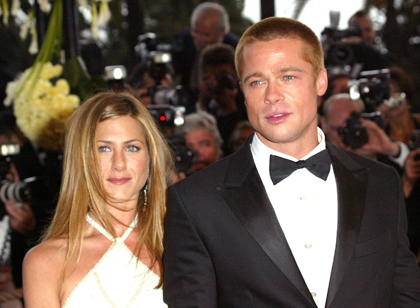 Jennifer Aniston and Brad Pitt during 2004 Cannes Film Festival - "Troy" Premiere at Palais Du Festi...