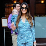 Olivia Munn knows kicks from babies are a part of the mom deal. Here, she and John Mulaney depart th...
