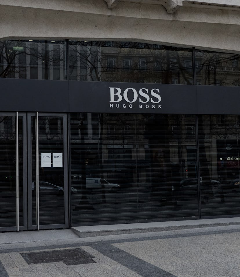 PARIS, FRANCE - MARCH 16: General view of the closed Hugo Boss store, at Avenue des Champs Elysees, ...