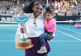 Serena Williams of the US with her daughter Alexis Olympia after her win against Jessica Pegula of t...
