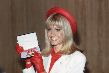 Australian pop singer Olivia Newton-John after receiving her OBE at Buckingham Palace, London, 13th ...