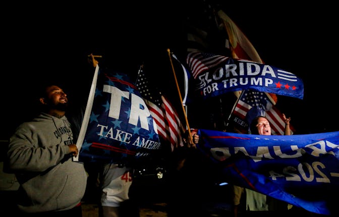 PALM BEACH, FL - AUGUST 08: Supporters of former President Donald Trump rally near his home at Mar-A...