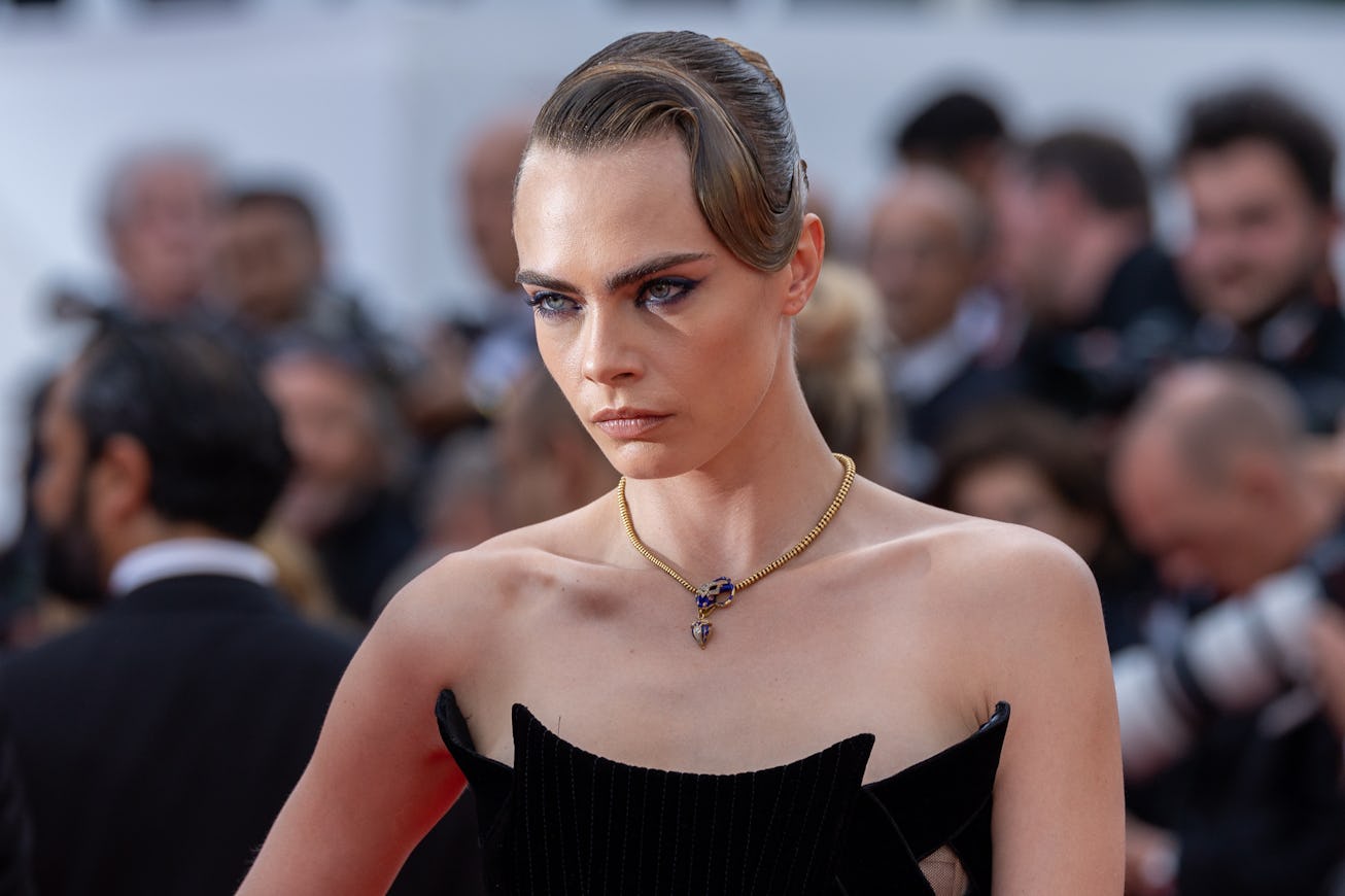 CANNES, FRANCE - MAY 24: Model Cara Delevingne attends the 75th Anniversary celebration screening of...