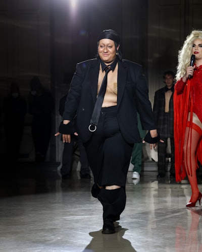 FLORENCE, ITALY - JANUARY 12: A model and fashion designer Ervin Latimer walk the runway at the "Lat...