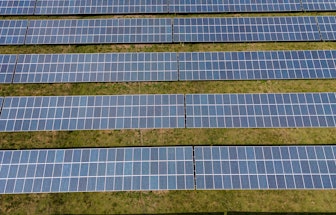 31 August 2022, Schleswig-Holstein, Büttel: An open-space photovoltaic plant (solar park) operated b...