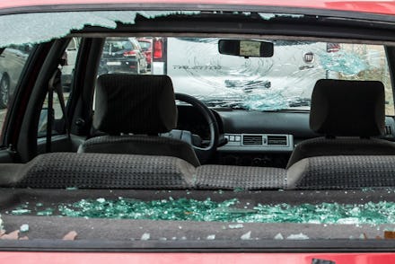 LA BISBAL D'EMPORDA, GIRONA, CA, SPAIN - AUGUST 31: The window of a broken vehicle, as a consequence...