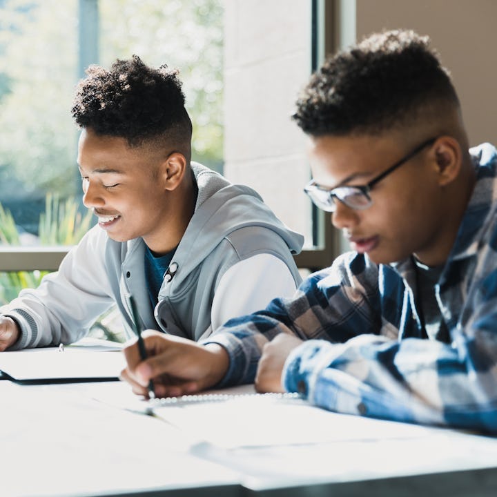 The young men focus on the exam they are taking today in class.This is the first year AP African Ame...