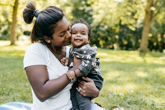 Mom enjoying outdoor time with baby possibly named a literary baby name like Calvin. 