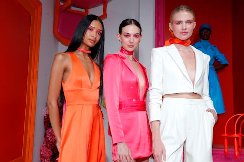 NEW YORK, NEW YORK - SEPTEMBER 10: Models pose during the alice + olivia by Stacey Bendet Spring 202...
