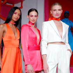 NEW YORK, NEW YORK - SEPTEMBER 10: Models pose during the alice + olivia by Stacey Bendet Spring 202...