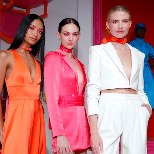 NEW YORK, NEW YORK - SEPTEMBER 10: Models pose during the alice + olivia by Stacey Bendet Spring 202...