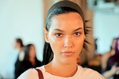 NEW YORK, NEW YORK - SEPTEMBER 10: A model prepares for the Jason Wu fashion show during September 2...