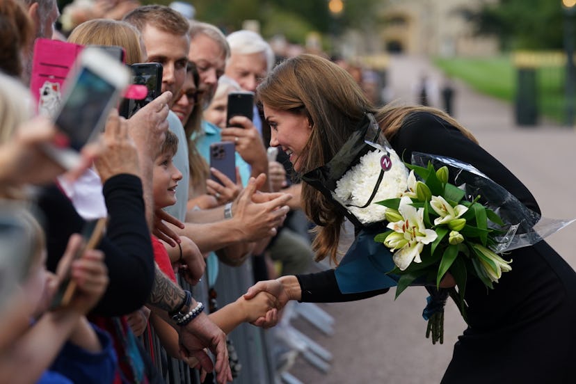WINDSOR, ENGLAND - SEPTEMBER 10: Catherine, Princess of Wales meets members of the public on the lon…