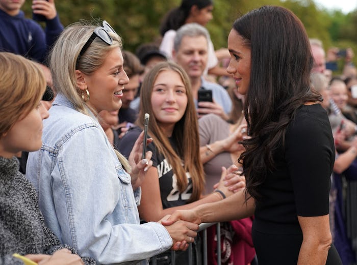 Meghan, Duchess of Sussex chats with well-wishers on the Long walk at Windsor Castle on September 10...