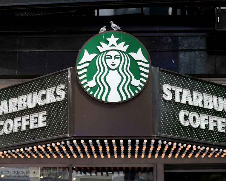 NEW YORK, NEW YORK - SEPTEMBER 3: A Starbucks logo is seen in Times Square on September 3, 2022 in N...