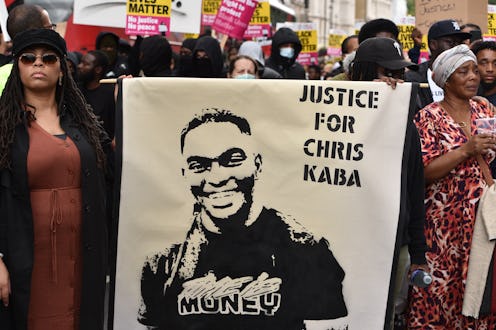 Protesters hold a banner during the Chris Kaba demonstration in London, September 2022