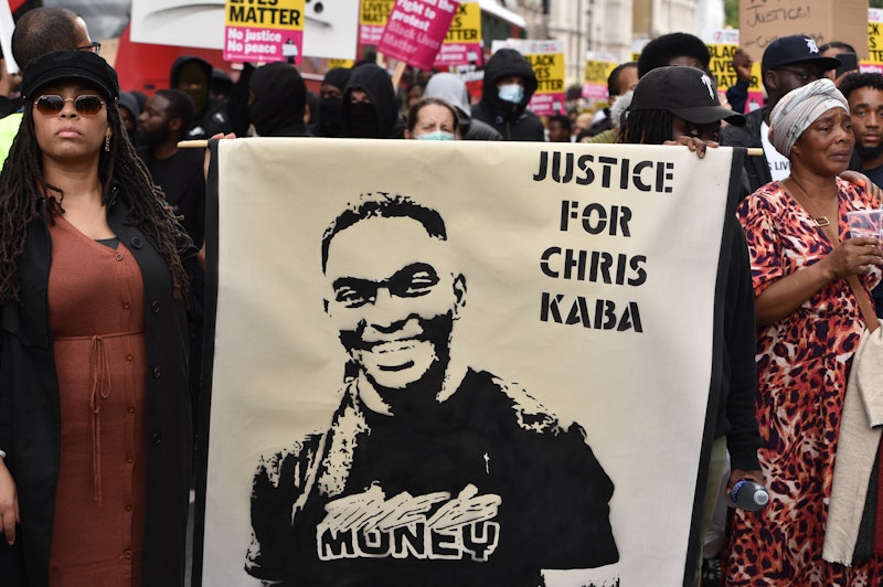 Protesters hold a banner during the Chris Kaba demonstration in London, September 2022