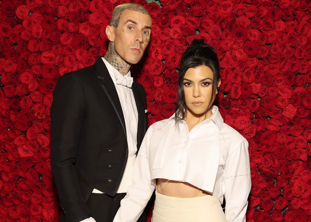 Travis Barker and Kourtney Kardashian arrive at The 2022 Met Gala. The pair would like to have a chi...