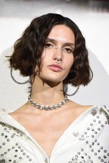 NYFW beauty trends include spike faux piercings  as seen on a model model posing at the Rebecca Mink...